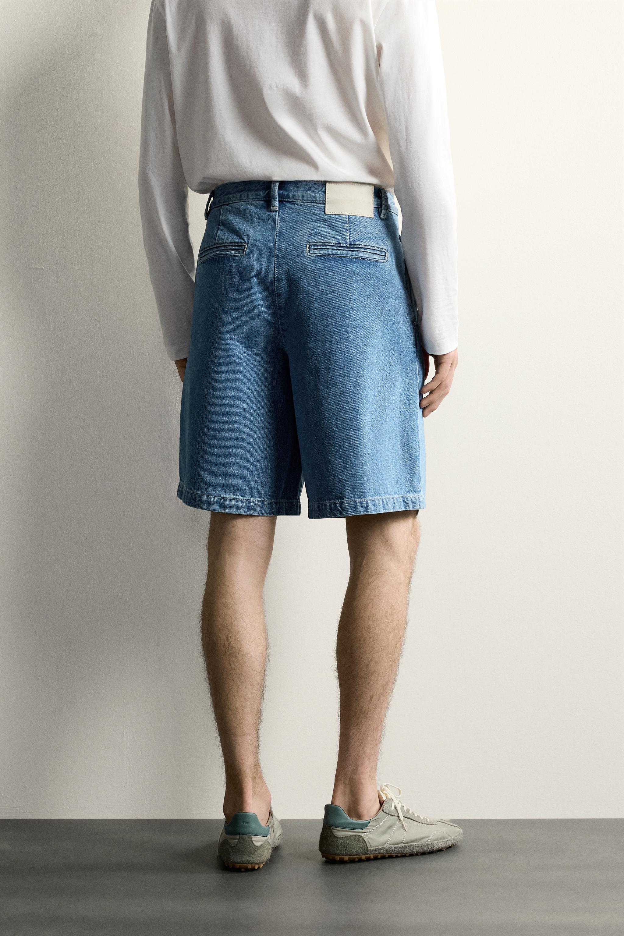 RELAXED FIT PLEATED DENIM CHINO SHORTS